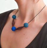 Geometric beaded necklace on a vegan rubber cord - Varily Jewelry - Colourful Contemporary Jewelry